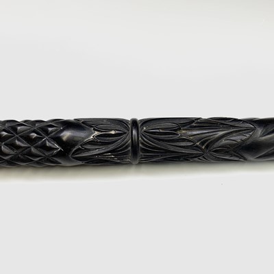 Lot 559 - An Indian ebony walking stick, circa 1900, the...