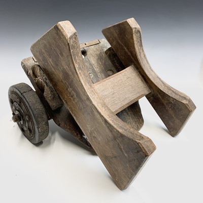 Lot 560 - A Vintage two-wheel elm brewery barrel trolley,...