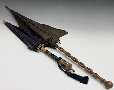 Lot 2820 - A long-handled parasol, by Briggs & Son of...