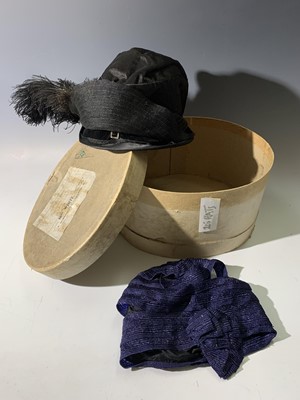 Lot 2831 - Two 1920s hats, one dark blue cloche style...