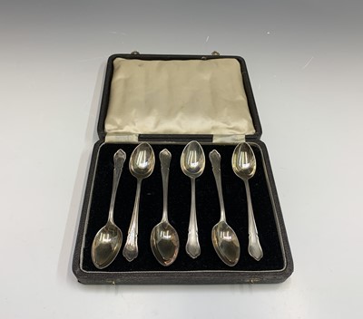 Lot 55 - Three sets of six silver teaspoons, 6.2oz each...
