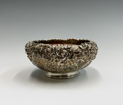 Lot 21 - A Chinese silver chrysanthemum decorated bowl,...