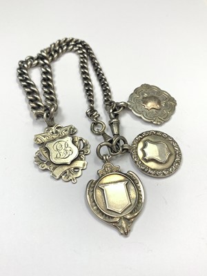 Lot 405 - A silver graduated curb link watch chain with...