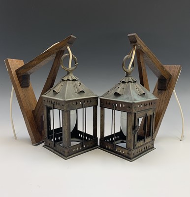 Lot 595 - A pair of square section brass lanterns with...