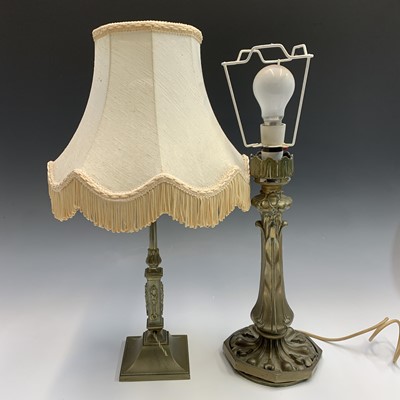 Lot 669 - A 19th century brass lamp base, with relief...