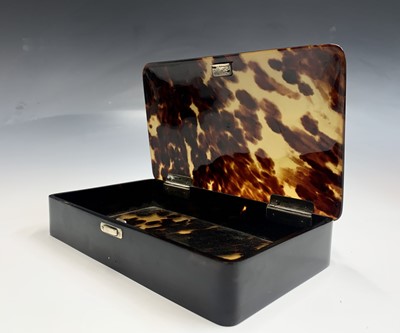 Lot 647 - A tortoiseshell box with silver hinges London...