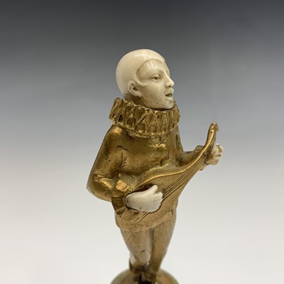 Lot 621 - A French Art Deco period gilt bronze and ivory...
