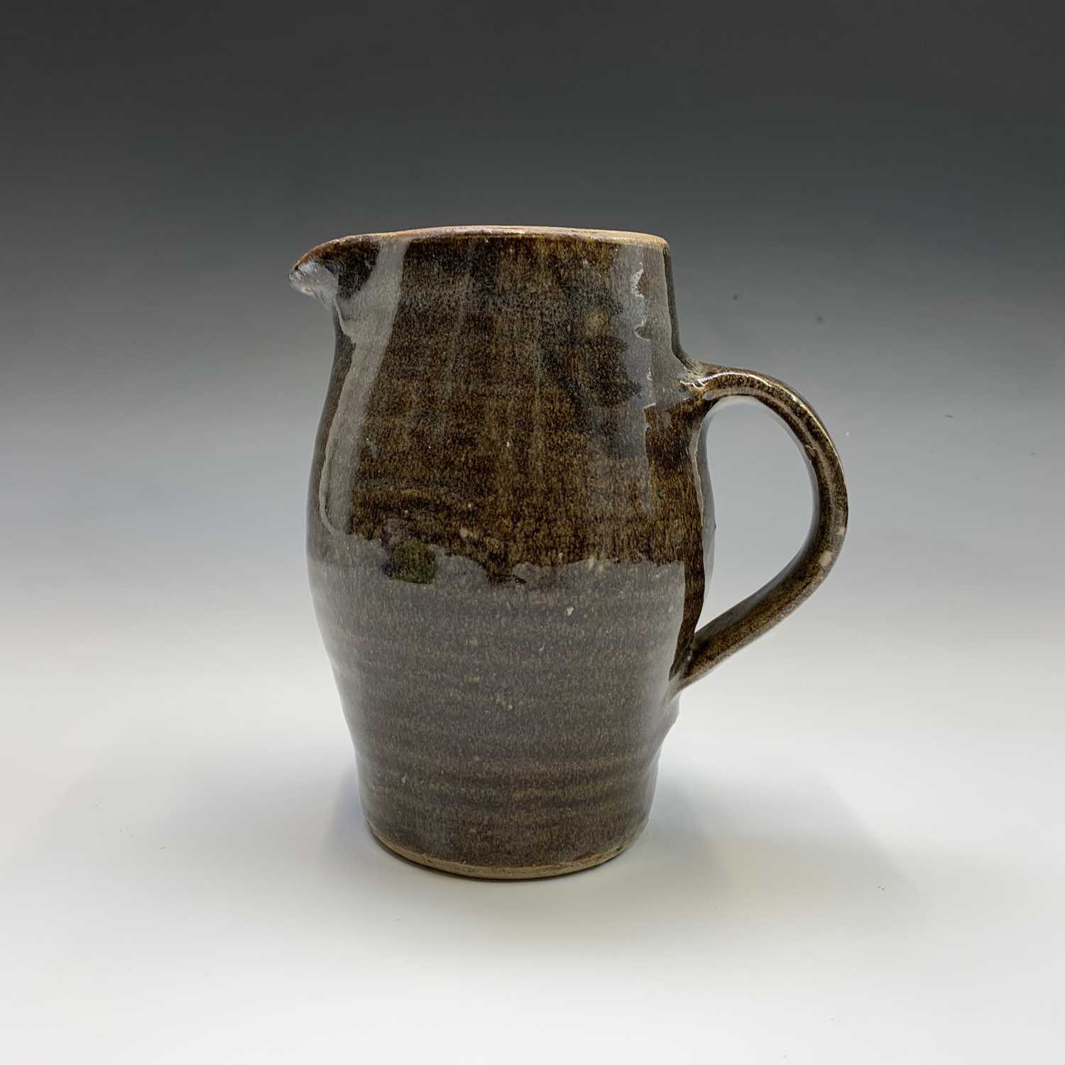 Lot 426 - A Leach Pottery, St Ives standard ware jug....