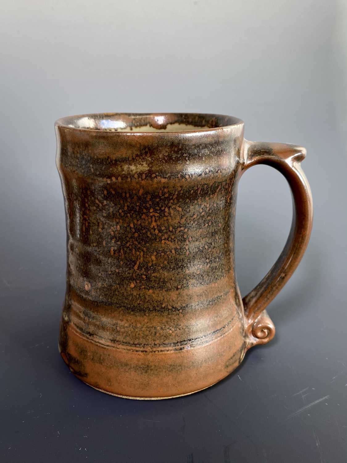 Lot 427 - A Leach Pottery, St Ives standard ware pint...