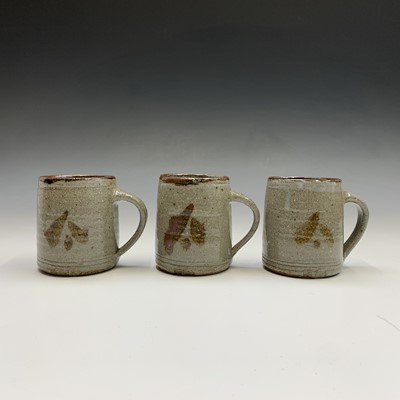 Lot 428 - Leach Pottery, St Ives - three mugs with...