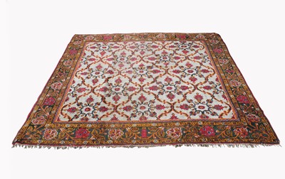 Lot 1201 - An Indian carpet, circa 1920, the ivory field...