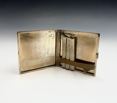 Lot 749 - A 9ct gold cigarette case by P G Dodd,...