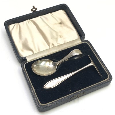 Lot 177 - A cased silver spoon and pusher christening set.