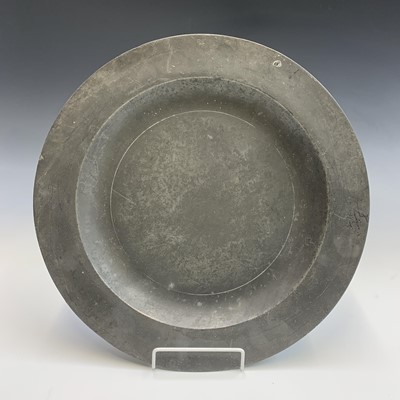 Lot 49 - A large 19th century pewter charger,...