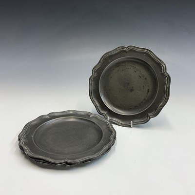 Lot 677 - A set of six pewter dinner plates, early 19th...