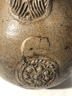 Lot 1107 - A 17th century Stoneware Bellarmine jug, with...