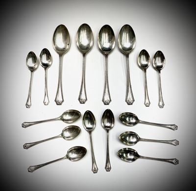 Lot 72 - A set of twelve beaded silver teaspoons and...