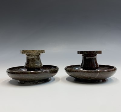 Lot 693 - A pair of Cornish serpentine candlesticks, of...