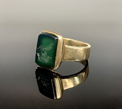 Lot 768 - A 9ct gold signet ring, the finely carved...