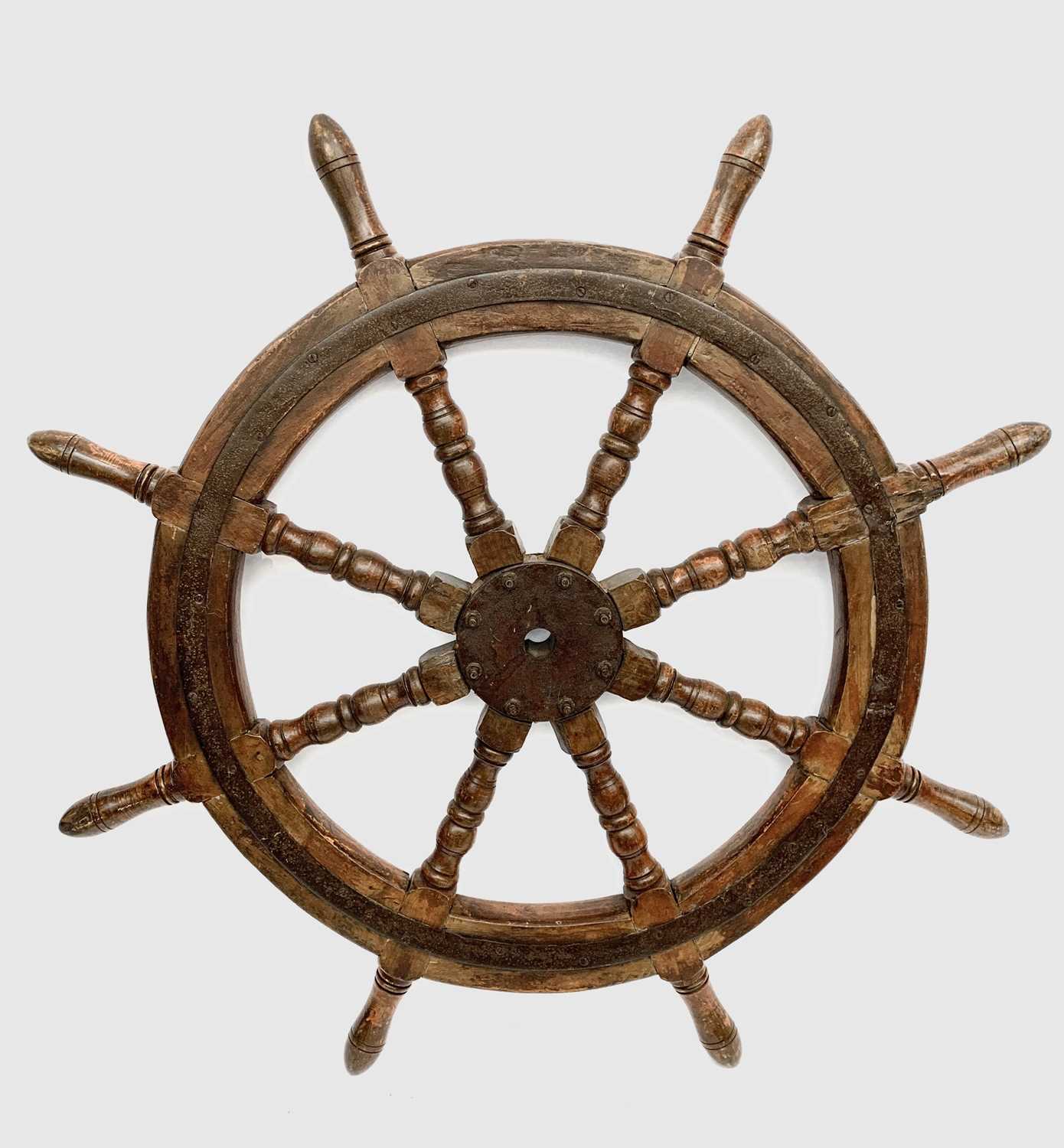 Lot 697 - A hardwood eight-spoke ship's wheel, circa...