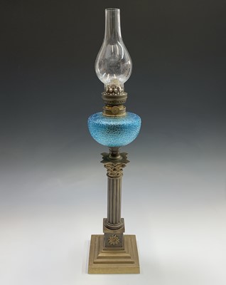 Lot 703 - A Victorian brass Corinthian column oil lamp...