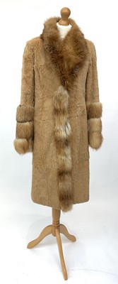 Lot 2855 - A Fox fur trimmed fur coat. Good clean...