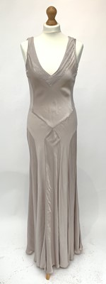 Lot 2861 - An elegant, bias cut long sleeveless dress in...