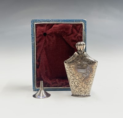 Lot 315 - A Sempoh chased silver scent bottle, boxed,...