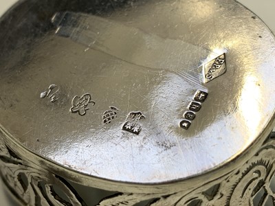 Lot 30 - A Dutch silver small basket, a silver Virgin...