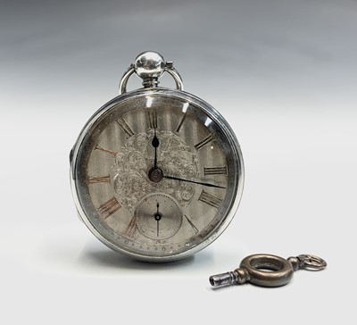 Lot 828 - A silver key wind open face pocket watch,...