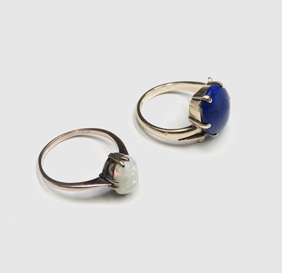 Lot 393 - Two 9ct gold rings, one set lapis, the other...