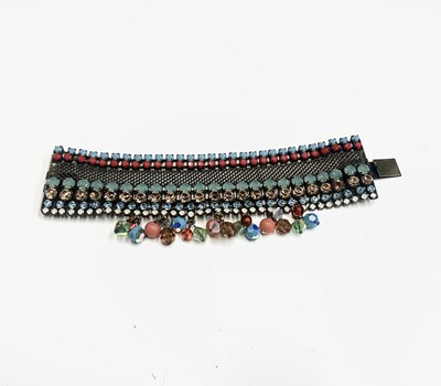 Lot 365 - A mesh multi-coloured bead cuff bracelet