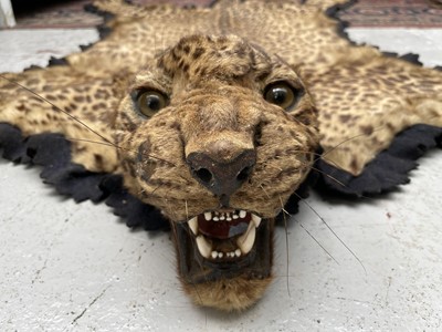 Lot 317 - An Indian leopard skin rug, by Van Ingen & Van...
