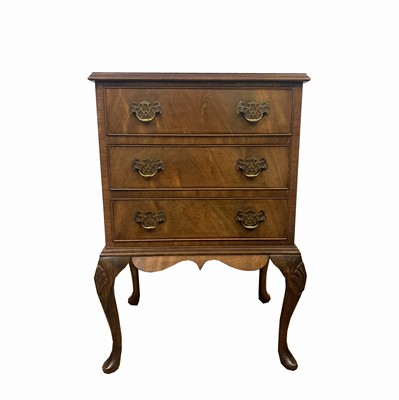 Lot 3011 - A George III style mahogany three drawer...