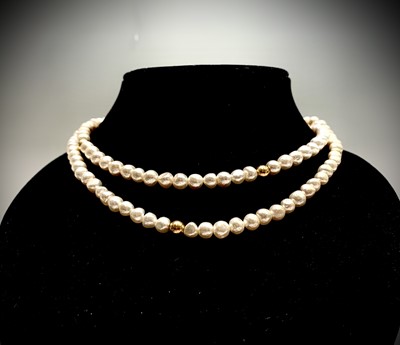 Lot 73 - Two pearl necklaces each with an 18ct gold...