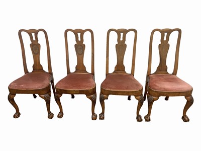 Lot 3005 - A set of four Queen Anne style walnut dining...