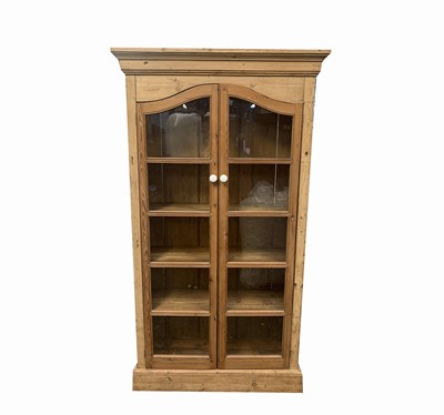 Lot 3008 - A Victorian pine cabinet, with a pair of...