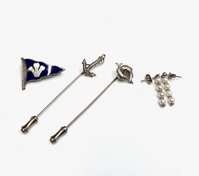 Lot 663 - Two gold sailors stick pins, a Royal Cornwall...