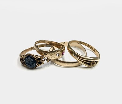 Lot 428 - Three 18ct gold rings and a 15ct gold ring 8gm