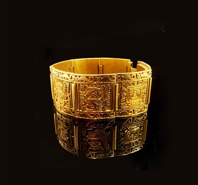 Lot 494 - A Peruvian bracelet of seven chased panels...