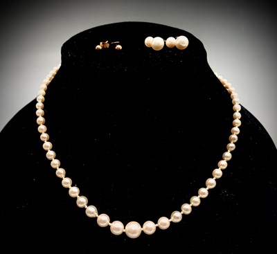 Lot 649 - A graduated pearl necklace with 9ct white gold...