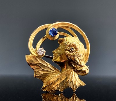 Lot 690 - An Art Nouveau brooch in the form of a female...