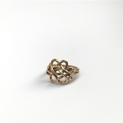 Lot 2635 - A 9ct gold Arts and Crafts Cornish love knot...