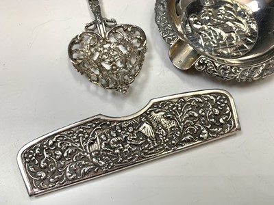 Lot 33 - Three pieces of Dutch embossed silver and four...