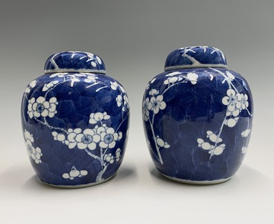 Lot 116 - A pair of Chinese prunus blossom ginger jars,...