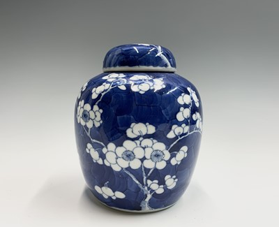 Lot 116 - A pair of Chinese prunus blossom ginger jars,...