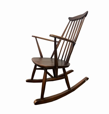 Lot 3032 - An Ercol rocking chair, height 86cm, width 61cm.