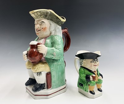 Lot 890 - A Staffordshire Toby jug, circa 1900, with...