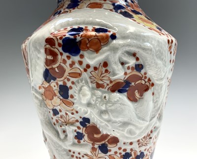 Lot 132 - A pair of Japanese Imari dragon moulded vases,...
