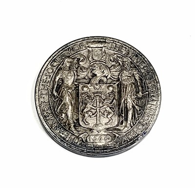 Lot 204 - Earls Court Gigantic Wheel token, a silver...